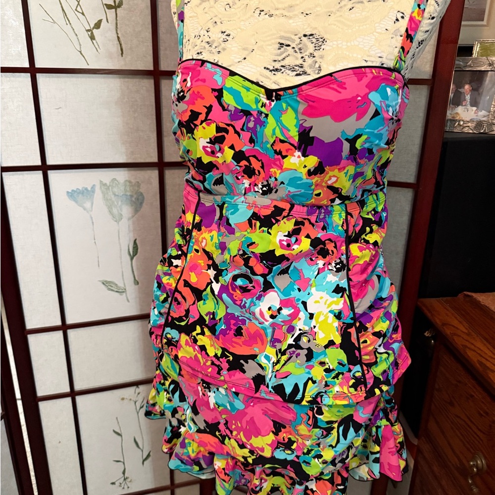 Kenneth Cole  two piece swim wear. Convertible strapless top and flounce bottom